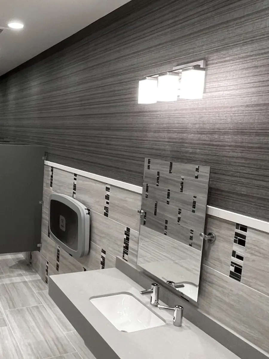 Commercial restroom with modern sinks
